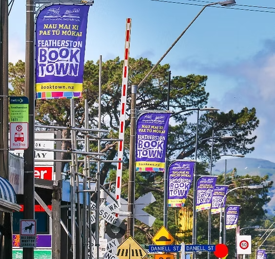 Colourful banners promoting Featherston Booktown! lining its main street